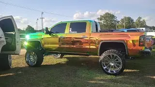 GMC Sierra Chameleon Chrome Wrapped on 26s x 14