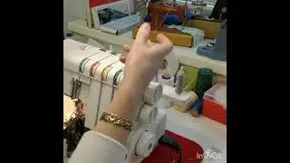 Заправка нижнего петлителя в оверлоке.