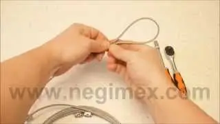 Negimex - pose de serre-câble sur un filin de suspension inox