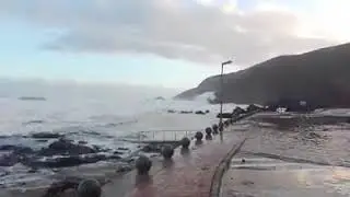 Big Wave catches lady - Herolds Bay - South Africa