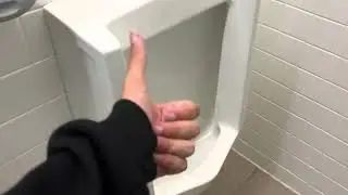 6,910. Moore Building Men&rsquo;s Restroom