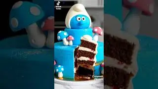 Watch This Whimsical Smurf Cake Get Cut &ndash; A Slice of Fun Awaits!