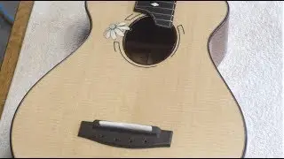 String Through Ukulele Bridge