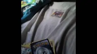Opening a Pokemon champion tin ( I got a secret rare)