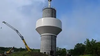 Water tower tank raising