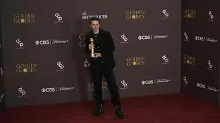 Hollywood A-listers pose with Golden Globe trophies | AFP