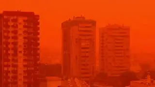 incredible ! Spain skies turn orange after Saharan dust cloud sweeps over country