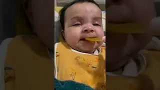 My daughter trying fruit puree for the first time || Food reaction || Sajjad Hasan