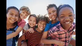 smile and play with the children swimming in the pool