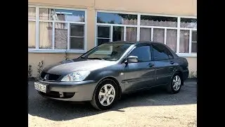 Mitsubishi Lancer, 2009, 1.6 AT (98 л.с.), Экспресс-обзор от Сергея Бабинова, Автосалон Boston