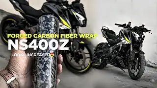 Forged carbon fiber wrap in NS400z | Iridium spark Plug , Air Filter
