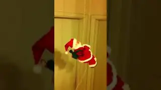 Climbing santa claus battery operated toy