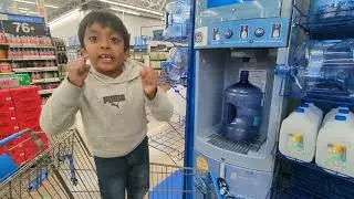 Akshay refilling primo water in Walmart.. it's kind of fun for him 😄