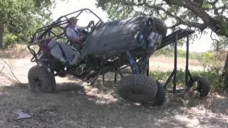 A couple of jeeps, flexing and floping on a RTI ramp