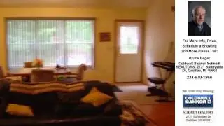7100 N James Road, Irons, MI Presented by Bruce Beger.