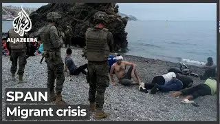 Spain returns people who swam from Morocco, adds troops to border