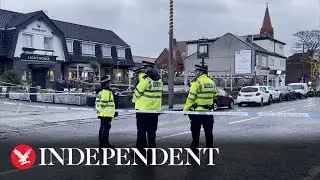 Police cordon off Wallasey pub after woman shot dead in Christmas Eve shooting
