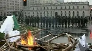 Riots break out during massive student protest in Chile