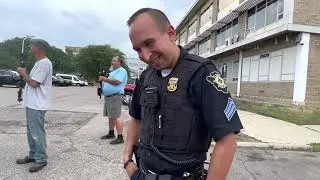 Surrounded in the City of Flint Police parking lot!