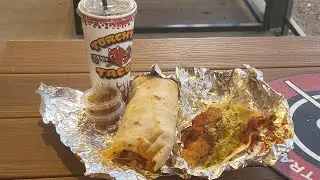 Eating Torchy tacos- taco of the  month the space cowboy, and breakfast burrito 