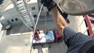 Rappel desde autoescala de Bombero