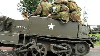 Universal carrier with 6 pounder driving past