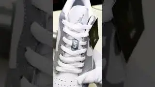 Air Jordan 1 Low Wolf Grey close up detail.