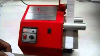 Hand Held Label Dispenser Machine.wmv