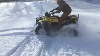 Foreman 450 Kenda Bear Claw HTR in the snow