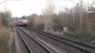 Bx-Wagen und BR 143-304 verlassen die Haltestation Dortmund-Wickede West.