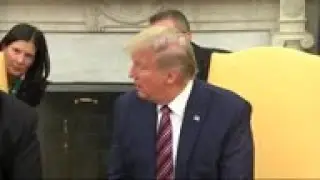 Trump: I am backing  war fighters  in SEAL case