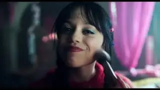 Wednesday in pink and colors dancing and smiling - Woe Thyself