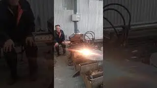 Oxy-acetylene cutting flame produced by burning acetylene gas with oxygen to cut metals