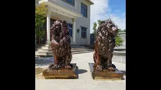 large outdoor sitting lion garden statue pair for sale