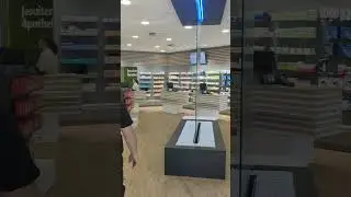 Follow Me To The Beautiful Glass Indoor Waterfall With A 3D Logo