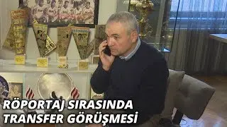 Rıza Çalımbay, röportaj sırasında transfer görüşmesi