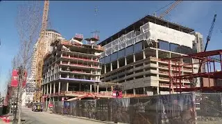 Последняя балка офисной башни PWC установлена ​​в Ballpark Village