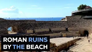 What makes the Tarragona Amphitheater a must-see site in Catalonia?