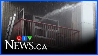 One person in custody after apartment building fire in North London