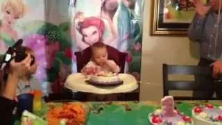 Riley eating her first birthday cake