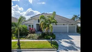 Custom 3-Car Garage Waterfront Pool Home | Luxury Living In Apollo Beach, FL