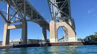Paddling under the Blue Water Bridges in the St. Clair River between the US and Canada