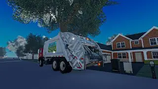 Rochelle Disposal | Mack MR Rear Loader Crushing Garbage