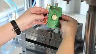 PCB overmolding, vertical insert molding,multi shot injection molding,vertical injection molded.