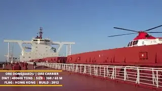 Pilot boarding ore carrier by helicopter | Ore Dongjiakou