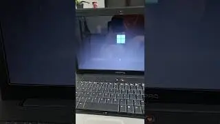Windows 11 23H2 boot logo on a 2008 Compaq Presario CQ61