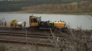 CP Cranbrook Sub....Work crew on Fenwick Mainline.Train on siding.