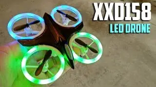 Обзор мини-светодиодного дрона Xin Xiang Da