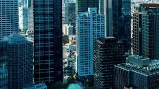VideoVault Stock Video: Tokyo Japan office building on a variable weather day time-lapse
