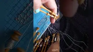 UN NUEVO CIERRE DE ENCAJE DE BOLILLOS